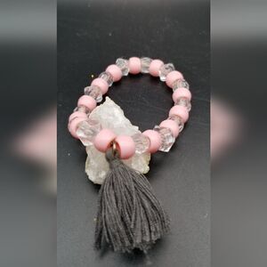 Easy to maintain tassel bracelet. B627